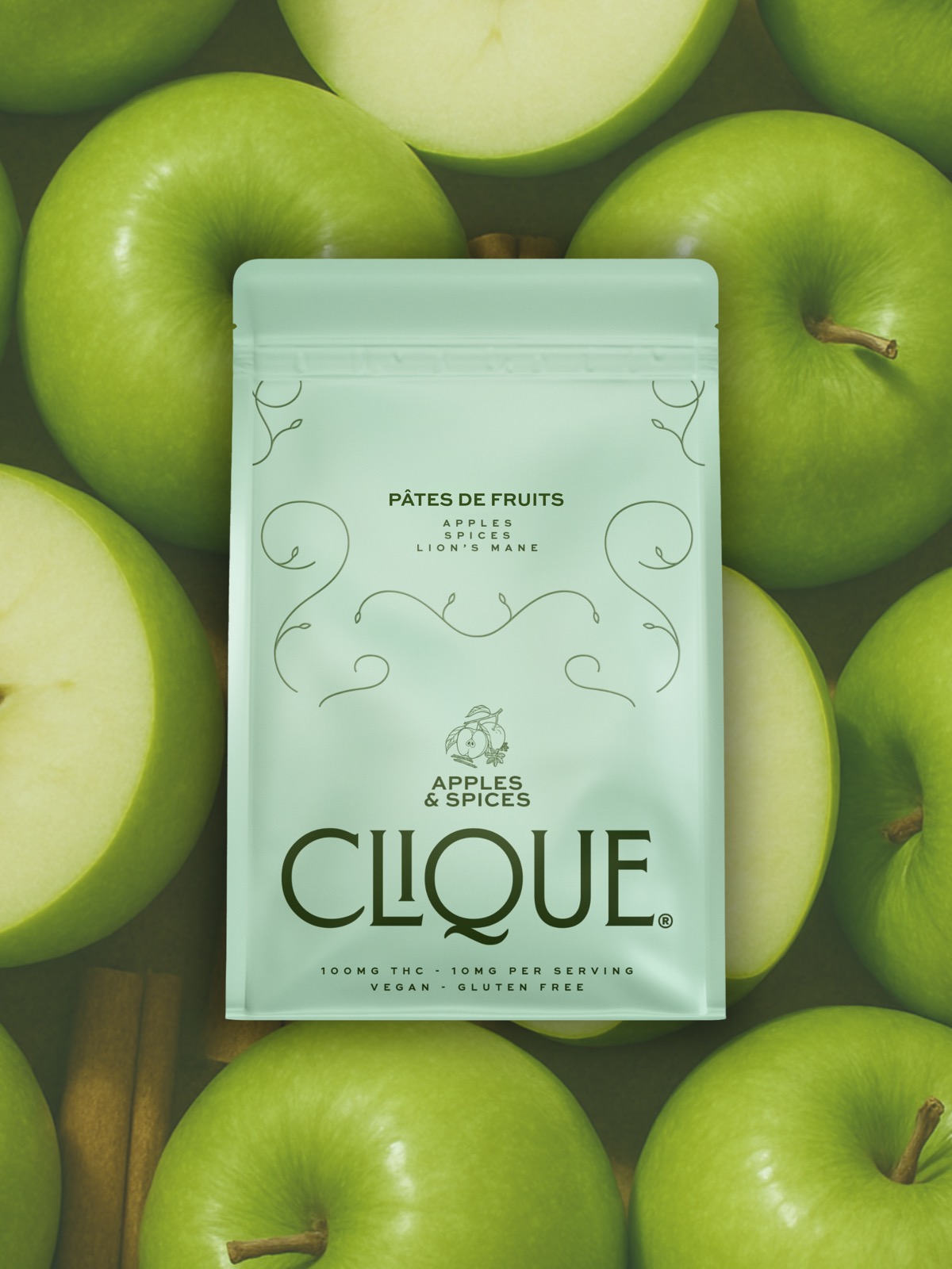 Clique Apples & Spices package on a bed of fresh green apples
